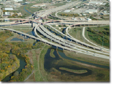aerial photography of I-35 Freeway and George Bush Tollway in Carrollton, TX